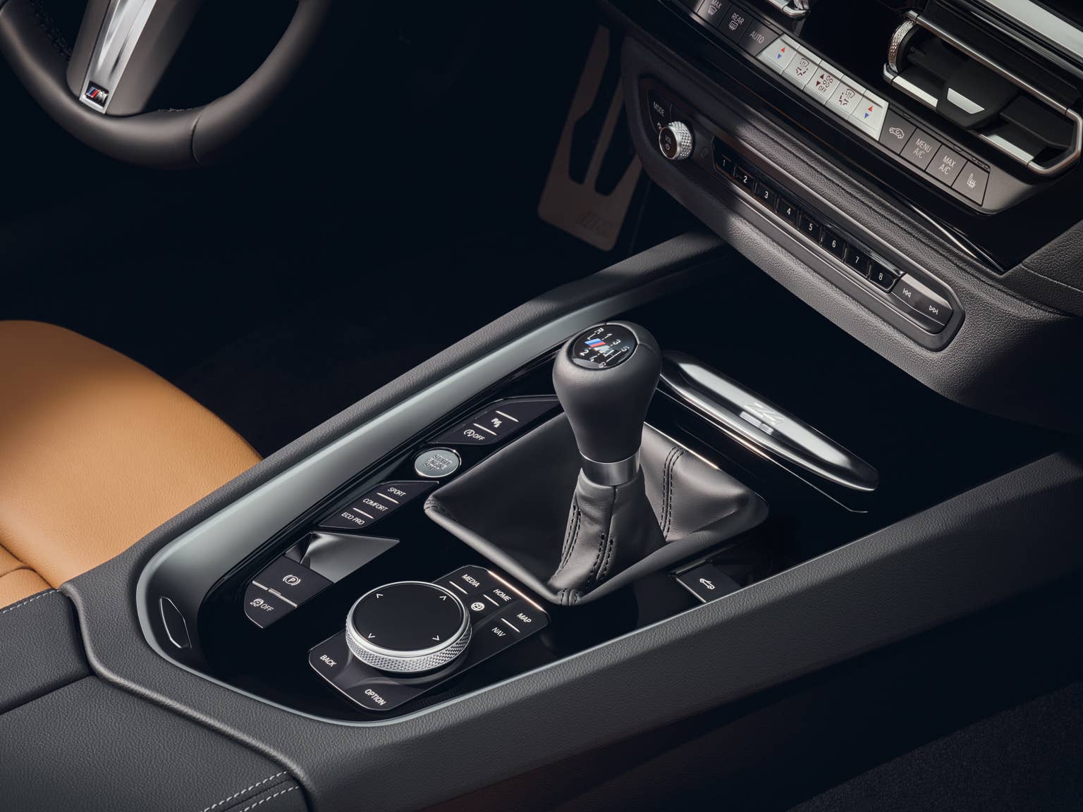 BMW M manual transmission shifter in a performance sports car